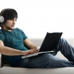 boy on computer with headset